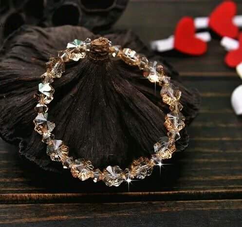 LT003_Lắc tay pha lê cỏ 4 lá màu trà Giá bán: 309.000đ