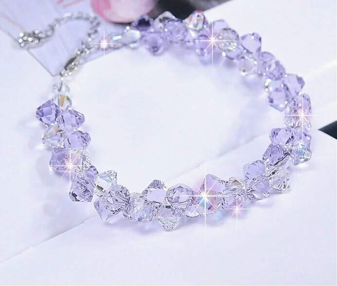 LT088 - lắc tay pha lê hạt tím LT088 - lắc tay pha lê hạt tím Giá bán: 375.000đ
