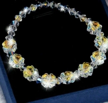 LT004-lắc tay pha lê hình hoa trắng LT004-lắc tay pha lê hình hoa trắng